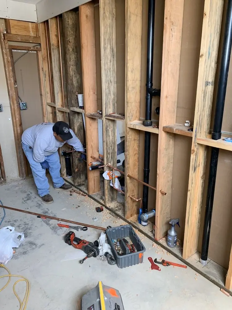 Commercial rough-in plumbing for Water Heater Replacement in Malone